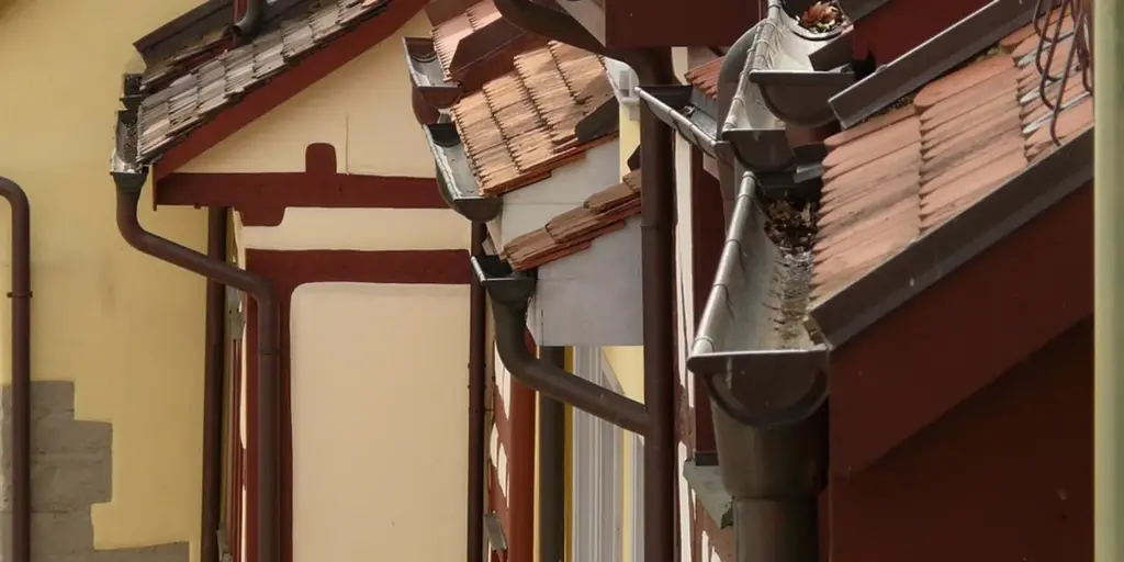 How Do You Install Gutters on Metal and Flat Roofs to Stop Leaks?